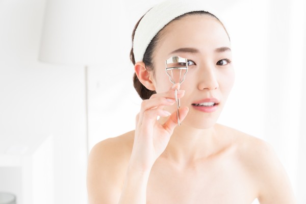 young attractive asian woman beauty image,eyelash curler