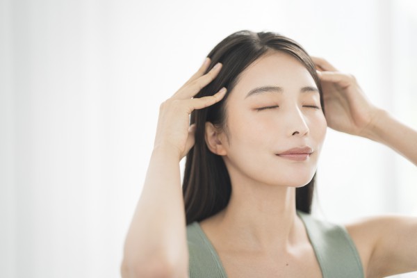 Portrait of a young dark-haired Japanese woman